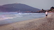 Jogging on the beach.
