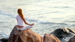 The young woman is practising the yoga. holiday relaxation.
