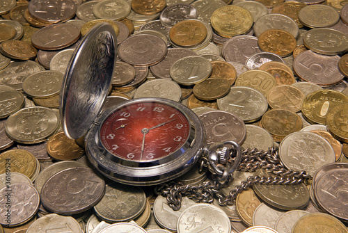 Photo: Pocket watch against Russian coins. Pocket watch against Russian coins.