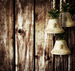 bells on wooden wall