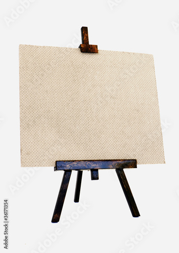 Photo: Empty canvas on a wooden tripod Empty canvas on a wooden tripod