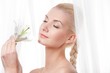 Beautiful blond woman with white lily flower Beautiful blond woman with white lily flower