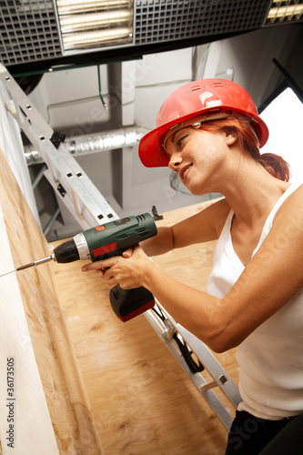 Photo: female carpenter on duty female carpenter on duty