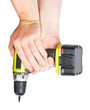 battery screwdriver in hand