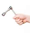 hand with wrench