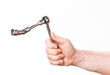 hand with wrench