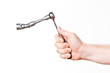 hand with wrench