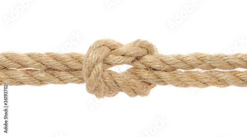 Photo: Rope with Reef Knot on White Background Rope with Reef Knot on White Background