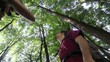 Video: young people doing birdwatching activity in woods young people doing birdwatching activity in woods