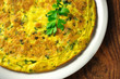 Italian omelette with parsley and parmesan cheese, closeup