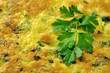 Italian omelette with parsley and parmesan cheese, closeup