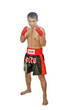 muay thai holds hands clenched in fists before himself. muay thai holds hands clenched in fists before himself.