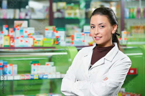 Photo: Pharmacy chemist woman in drugstore Pharmacy chemist woman in drugstore