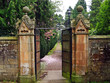 Old, beautiful gate leading to the garden Old, beautiful gate leading to the garden