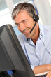 Customer service employee with headphones