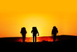 tourist silhouettes at sunset