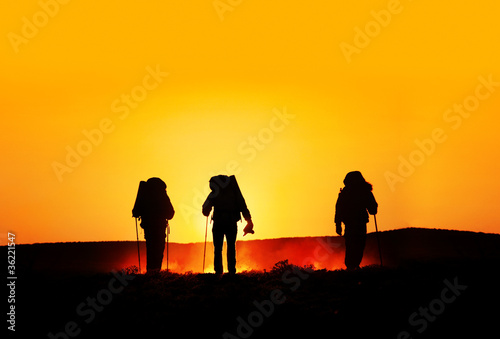 Photo: tourist silhouettes at sunset tourist silhouettes at sunset