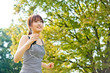 beautiful asian runnning in the park
