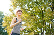 beautiful asian runnning in the park