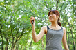 beautiful asian woman walking in the park