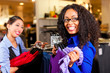 Women in a shopping mall with clothes