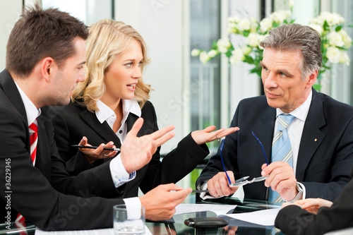 Photo: Business - Besprechung in einem Büro Business - Besprechung in einem Büro