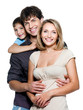 Photo: Happy pretty young family with son Happy pretty young family with son