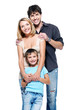 Photo: Happy family with child - isolated Happy family with child - isolated