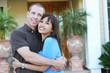 Diverse couple at home
