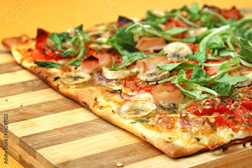 Photo: EDZR - Cheese, banana, ham, onion and arugula Pizza EDZR - Cheese, banana, ham, onion and arugula Pizza