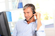 Customer service employee with headphones