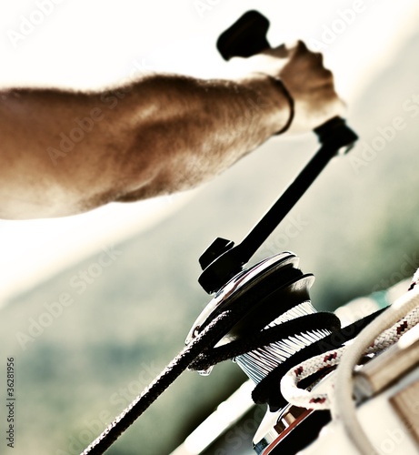 Photo: Sailor pulling ropes Sailor pulling ropes