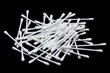 Cotton sticks isolated on black background