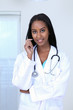 Smiling ethnic female doctor