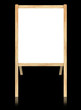 Empty whiteboard with wooden frame isolate on black background.