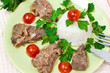 Photo: Liver fried with onion, rice and tomato cherry Liver fried with onion, rice and tomato cherry
