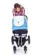 Foto: young mother with baby stroller white background young mother with baby stroller white background