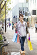 Asian shopping woman in town