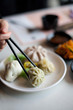 dimsum with wooden chopsticks