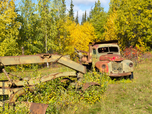 Photo: Rusty Truck and Grader forgotten in fall forest Rusty Truck and Grader forgotten in fall forest
