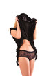 shy girl hiding her face over hem of the skirt