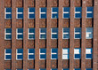 Foto: Facade of an old red brick building Facade of an old red brick building
