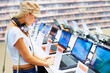 Pretty lady in retail computer store