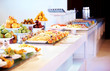 Variety of fancy salads displayed at buffet in restaurant