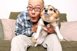 Asian man with pet dog.