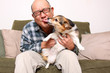 Asian man with pet dog.
