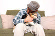 Asian man with pet dog.