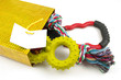 dog toys in a gold bag