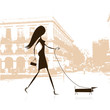 Woman walking with dog on the street