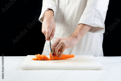 Photo: Chef cutting carrots Chef cutting carrots